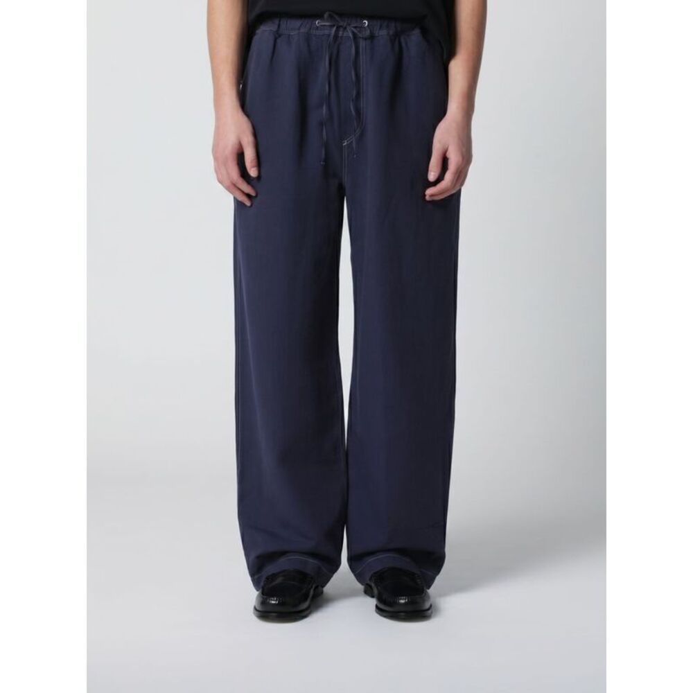 Studio Nicholson Pants Men Blue